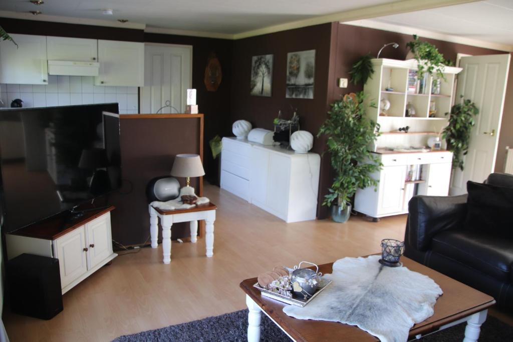 Köök või kööginurk majutusasutuses Veluwe Park Reewold Chalet Infinity