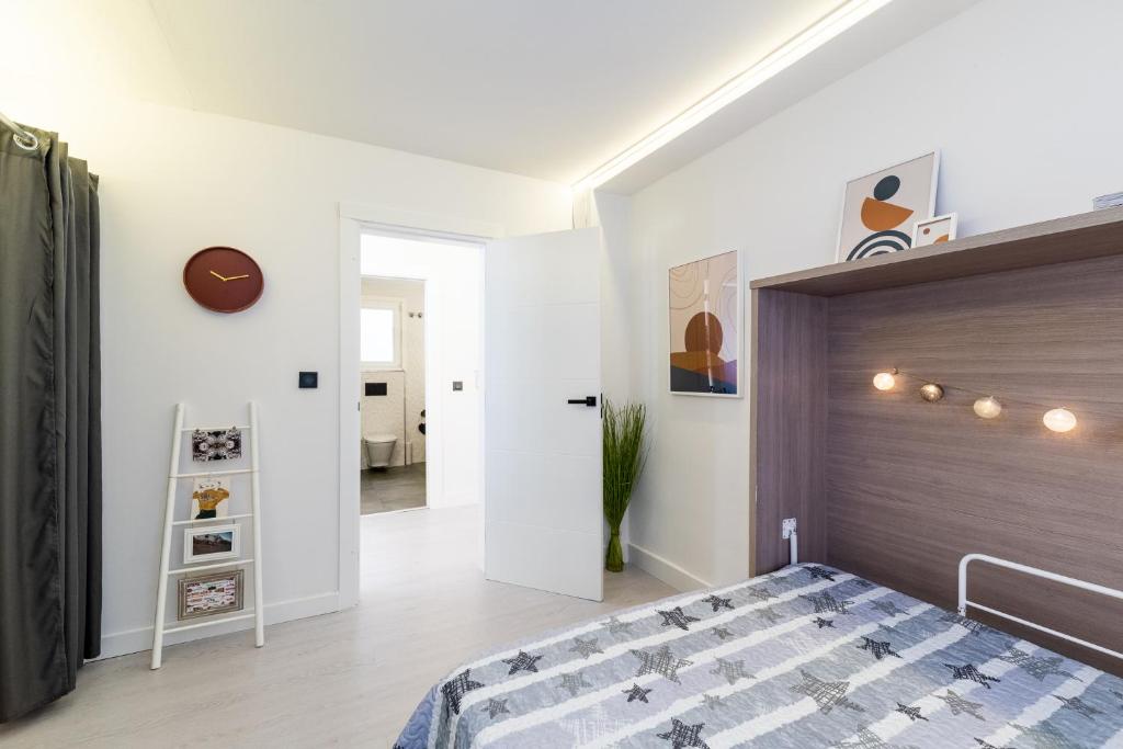 Posteľ alebo postele v izbe v ubytovaní Apartamento inteligente con vistas a la Alhambra