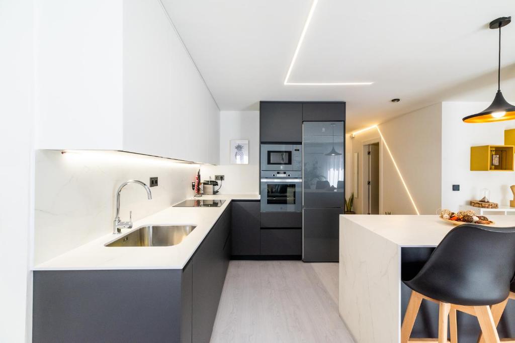 Kuchyňa alebo kuchynka v ubytovaní Apartamento inteligente con vistas a la Alhambra