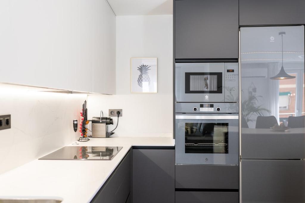 Kuchyňa alebo kuchynka v ubytovaní Apartamento inteligente con vistas a la Alhambra