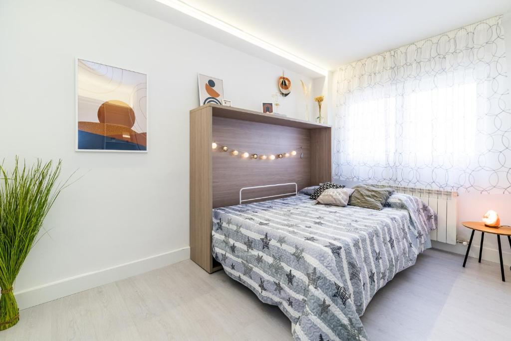 Posteľ alebo postele v izbe v ubytovaní Apartamento inteligente con vistas a la Alhambra