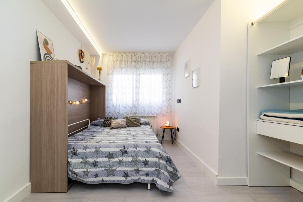 Posteľ alebo postele v izbe v ubytovaní Apartamento inteligente con vistas a la Alhambra