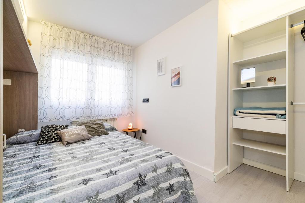 Posteľ alebo postele v izbe v ubytovaní Apartamento inteligente con vistas a la Alhambra