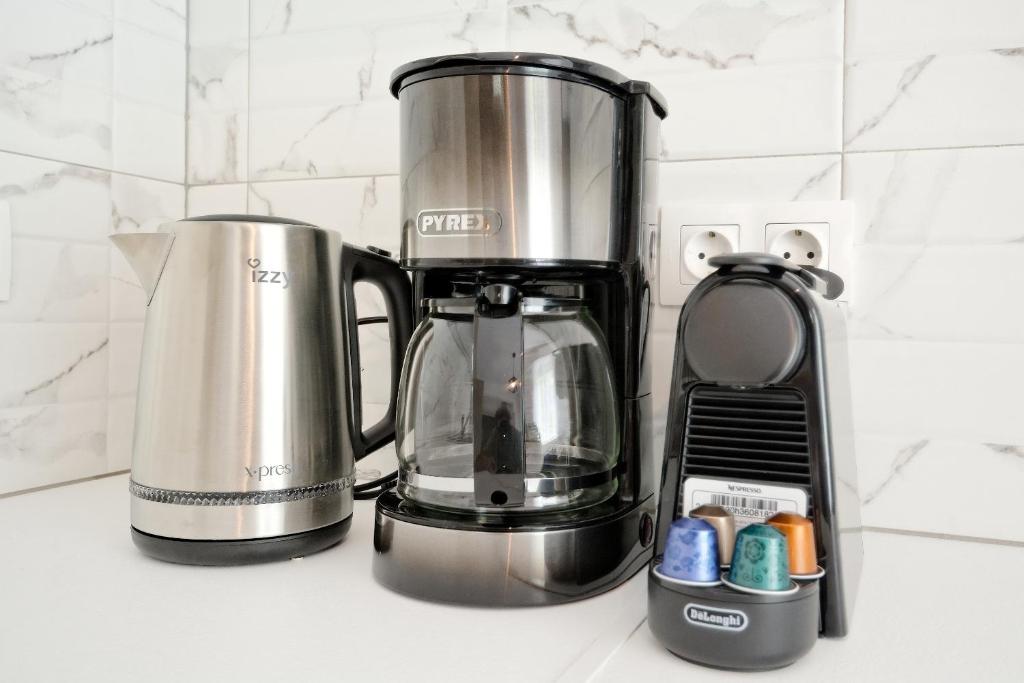 Coffee and tea making facilities at Elegant Big Apartment in Athens Center With Balcony