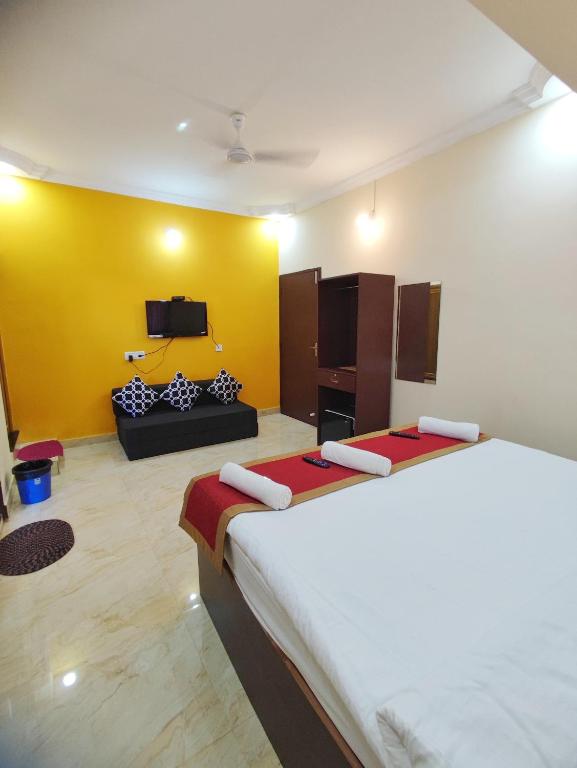 Postel nebo postele na pokoji v ubytování Hotel Candolim Aloft