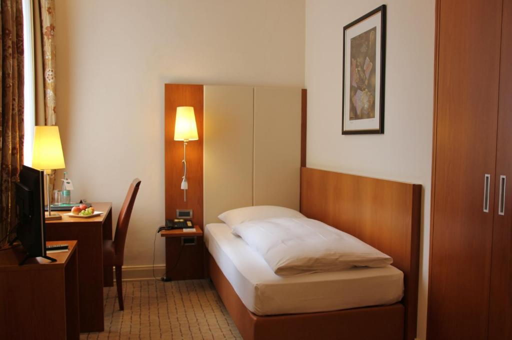 Postel nebo postele na pokoji v ubytování Hotel Vorbach