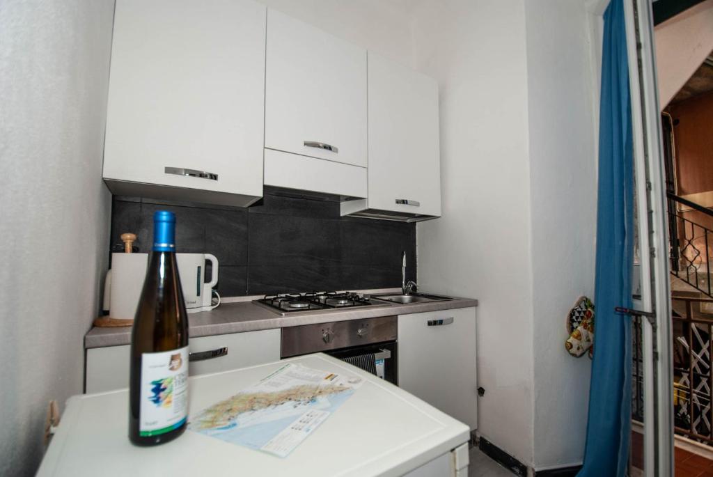 Kuchyň nebo kuchyňský kout v ubytování Casa Di Mezzo by Arbaspàa