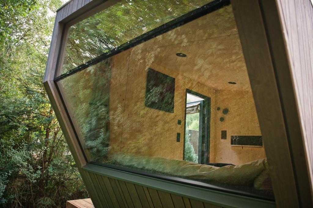 a view of a window of a house at Sleep Space 23 - Green Tiny Village Harz in Osterode