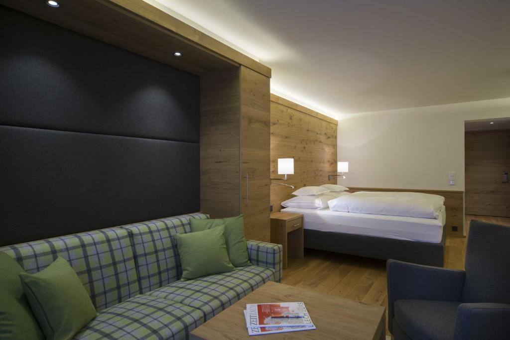 Postel nebo postele na pokoji v ubytování Hotel Garni Panorama