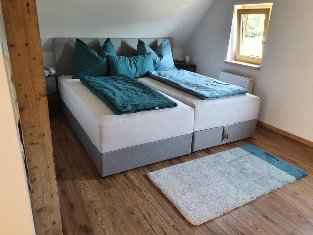 Postel nebo postele na pokoji v ubytování Apartments Nähe Red Bull Ring