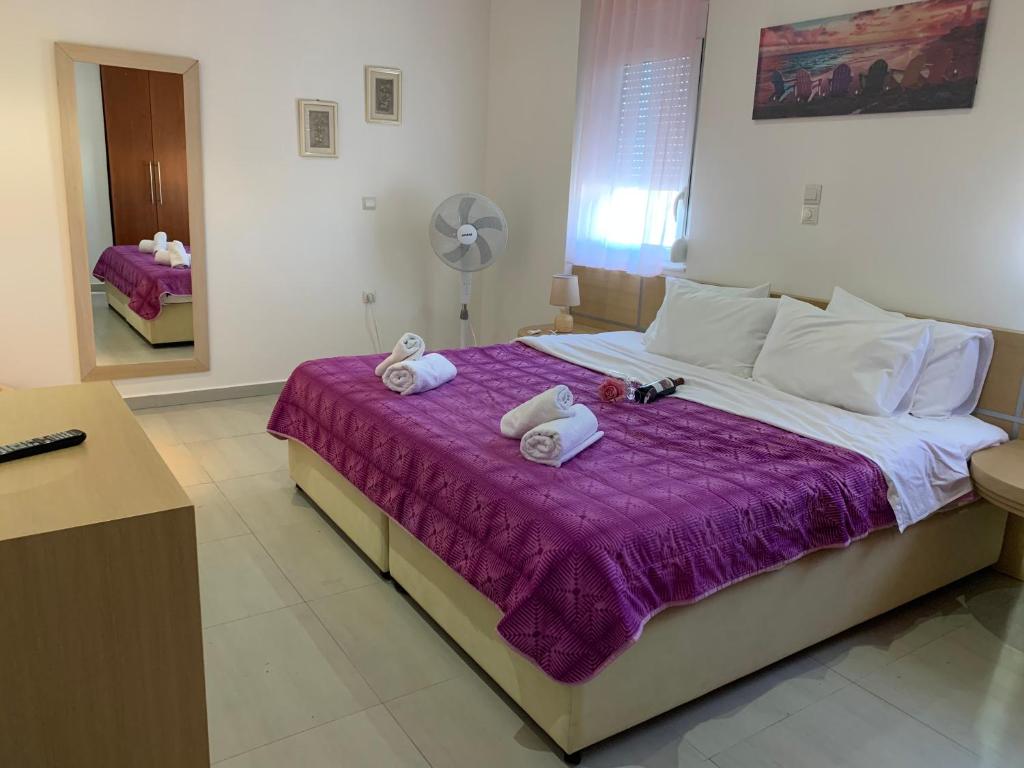 Posteľ alebo postele v izbe v ubytovaní Cozy Violeta