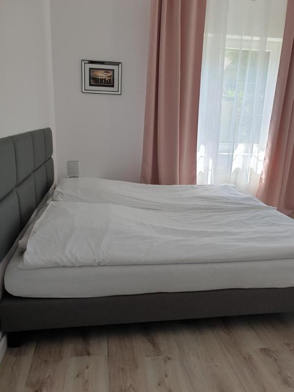 Posteľ alebo postele v izbe v ubytovaní Pokoje u Honi