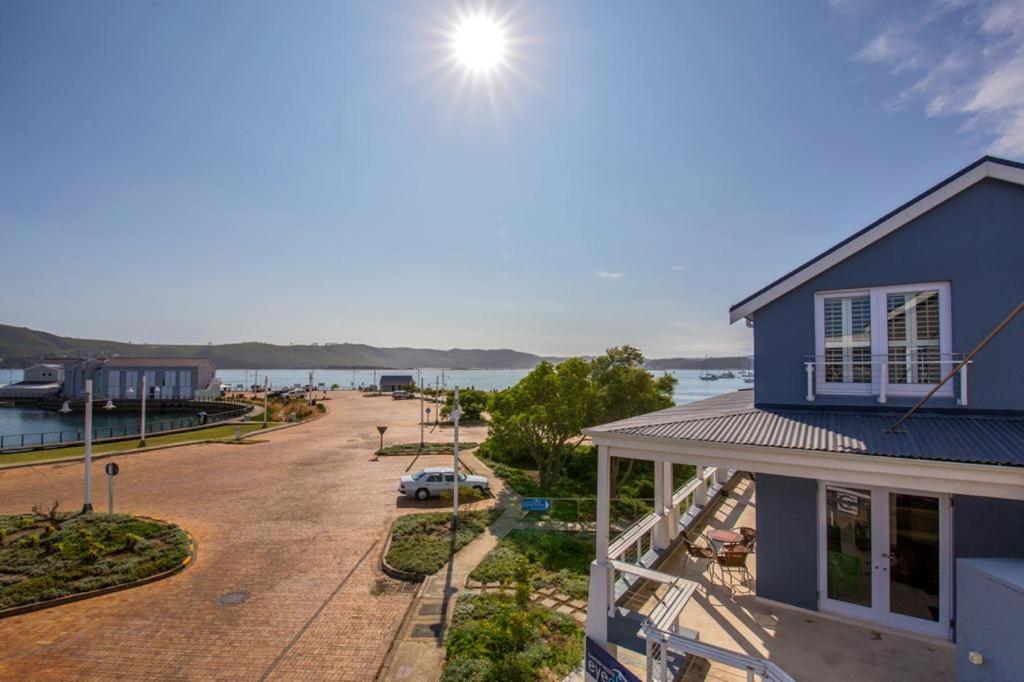a house with a view of a parking lot at Thesen Harbour Town Apartments @ Beautiful Knysna Villas in Knysna