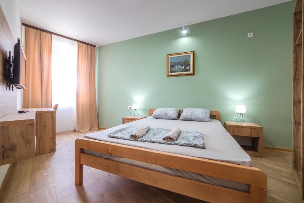 Postel nebo postele na pokoji v ubytování Zoe Pirot