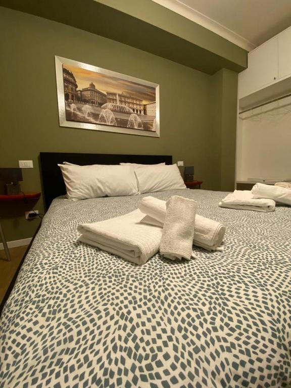 Postel nebo postele na pokoji v ubytování B&B Fossatello affittacamere