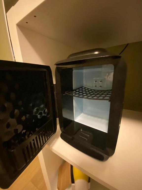 TV a/nebo společenská místnost v ubytování B&B Fossatello affittacamere