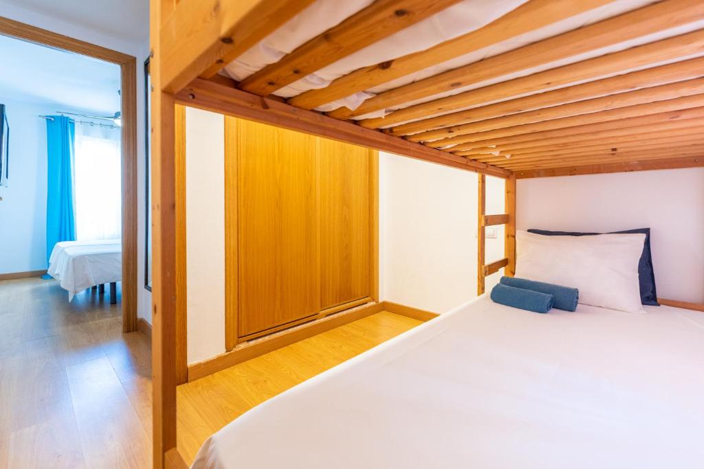 A bed or beds in a room at San Miguel Centro