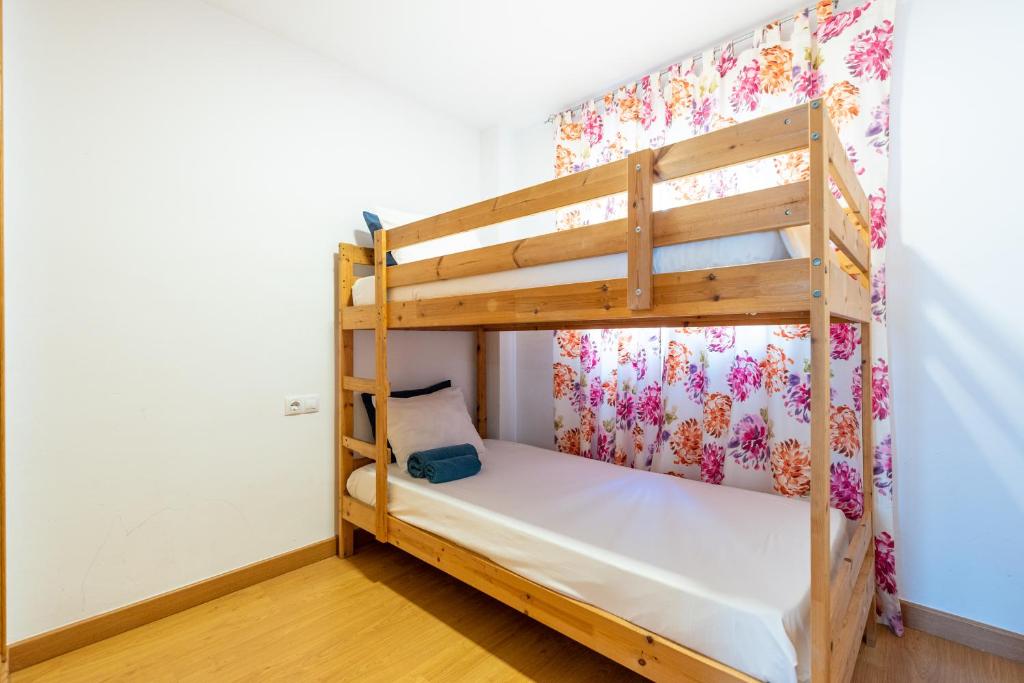 A bed or beds in a room at San Miguel Centro