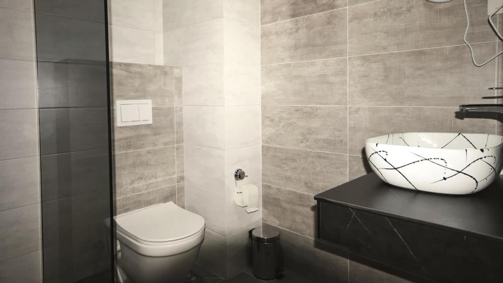 Koupelna v ubytování Hotel Callisto