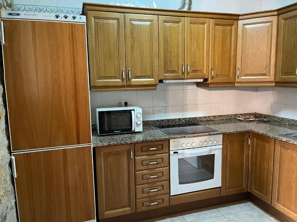 Kuchyň nebo kuchyňský kout v ubytování Complejo Rural La Glorieta