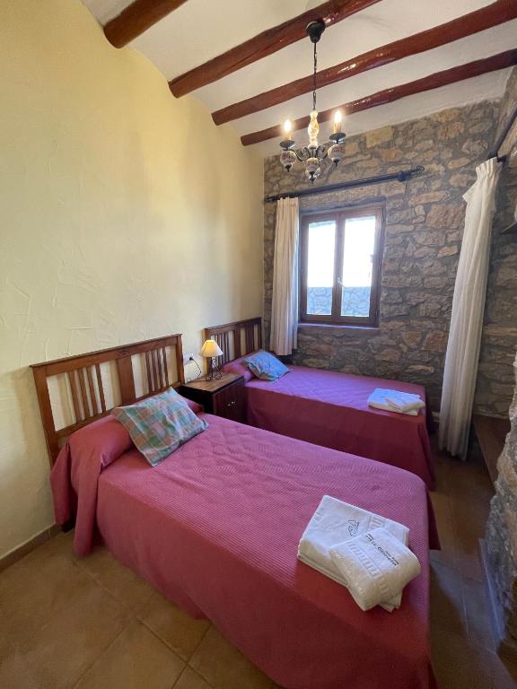 Postel nebo postele na pokoji v ubytování Complejo Rural La Glorieta