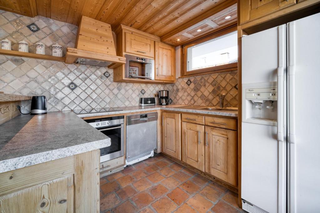 Kuchyňa alebo kuchynka v ubytovaní Chalet Nessa