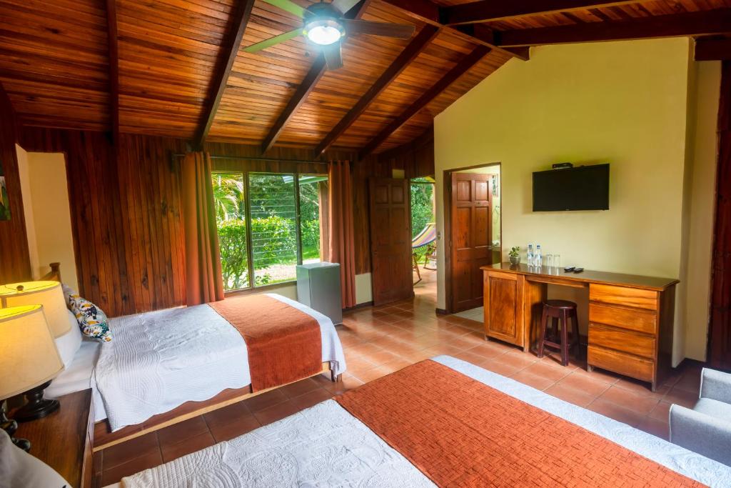 Postel nebo postele na pokoji v ubytování Rinconcito Lodge