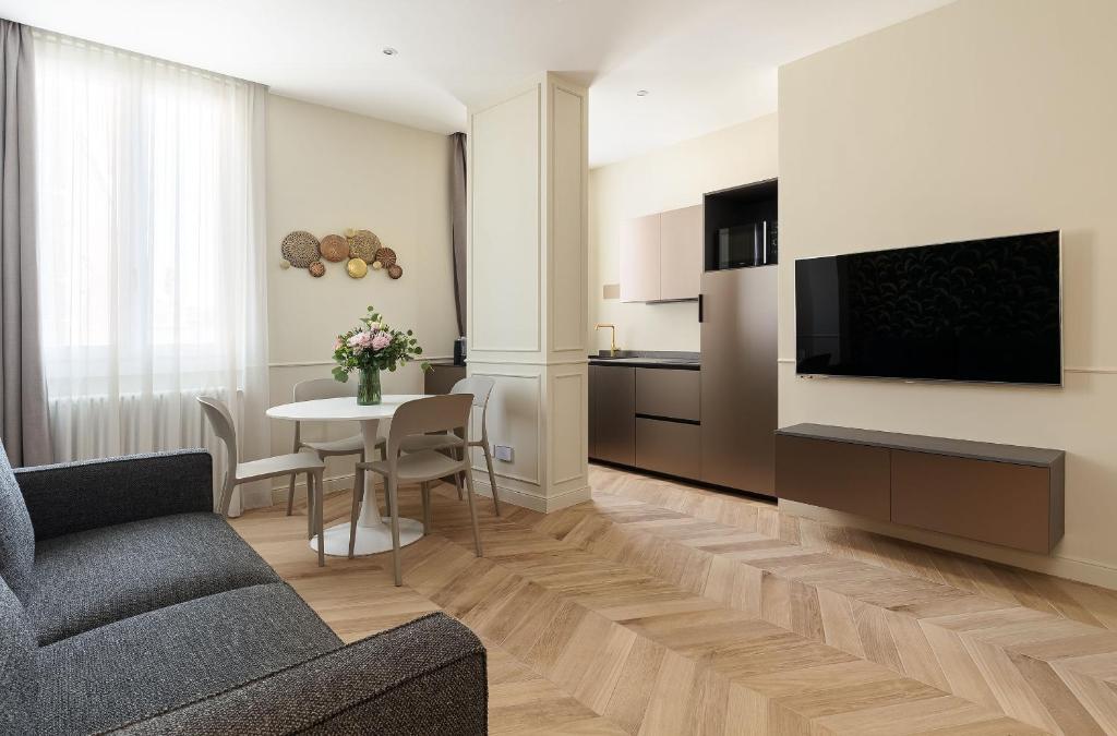 Telewizja i/lub zestaw kina domowego w obiekcie Casa Duomo Luxury Suites
