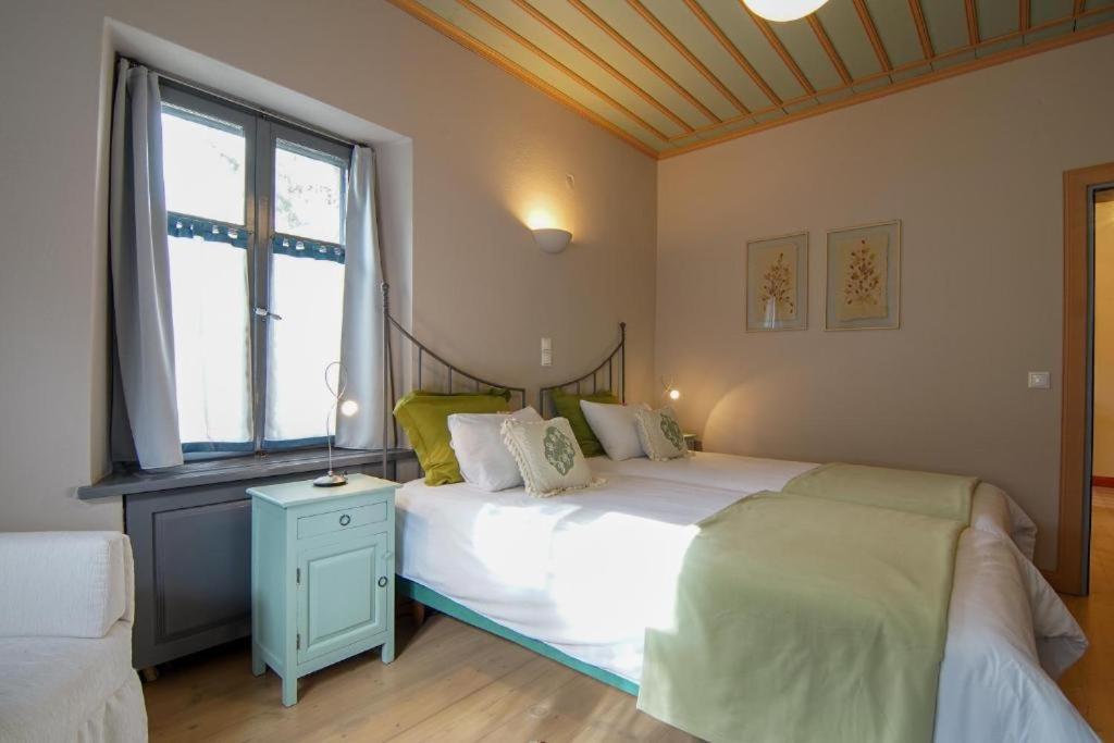 Postel nebo postele na pokoji v ubytování Kyriaki Guesthouse & Suites