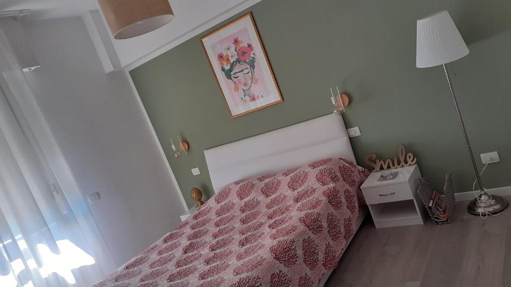 Postel nebo postele na pokoji v ubytování Casa di Kiki
