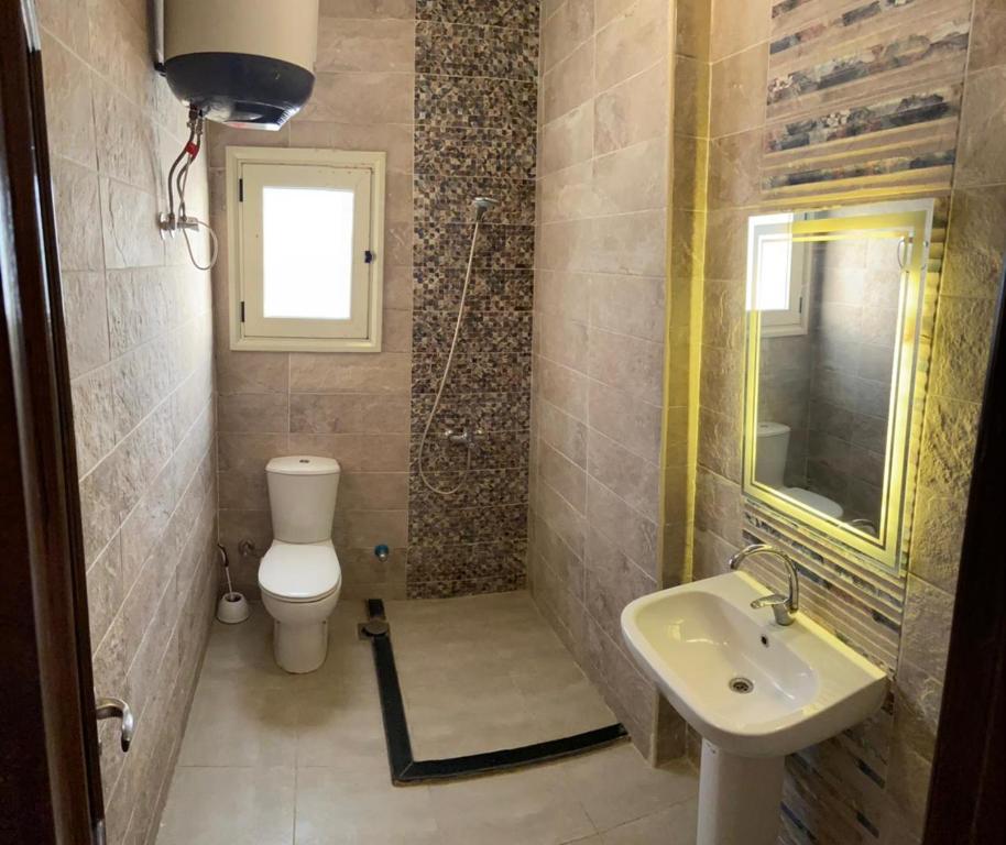 A bathroom at Bahga Palace 4 Residential Apartments