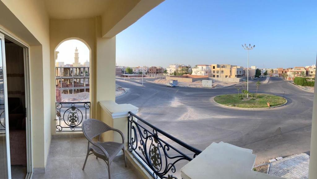 A balcony or terrace at Bahga Palace 4 Residential Apartments