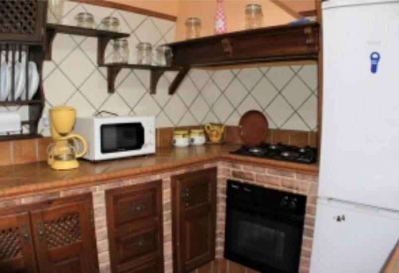 Kuchyňa alebo kuchynka v ubytovaní Villa Mari