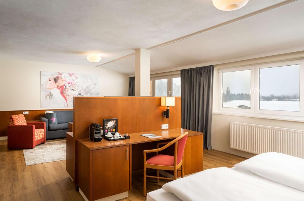 Postel nebo postele na pokoji v ubytování KUHOTEL by Rilano