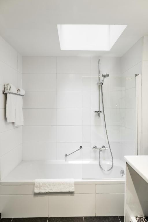 Koupelna v ubytování Zimmerhof Hotel