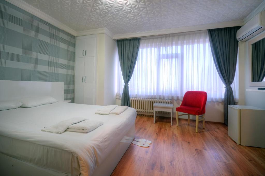 Krevet ili kreveti u jedinici u okviru objekta Hotel Abro Necatibey