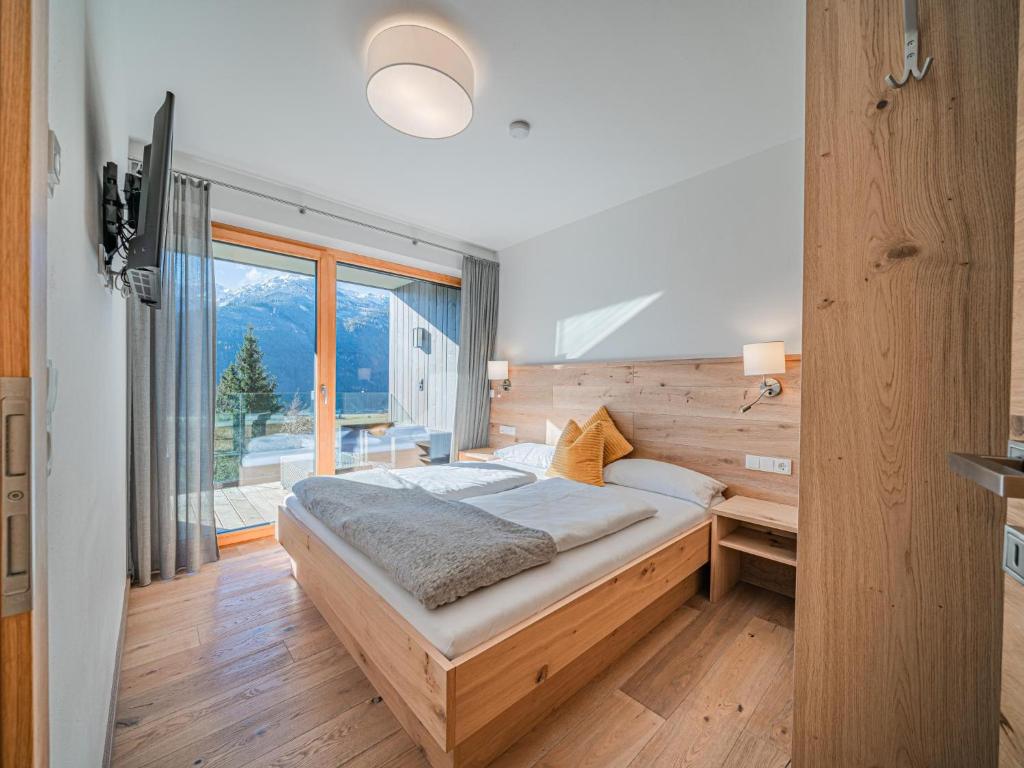 Postel nebo postele na pokoji v ubytování Tauern Juwel Top 8