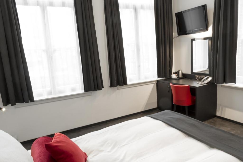 TV a/nebo společenská místnost v ubytování Zimmerhof Hotel