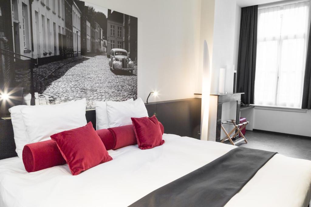 Postel nebo postele na pokoji v ubytování Zimmerhof Hotel