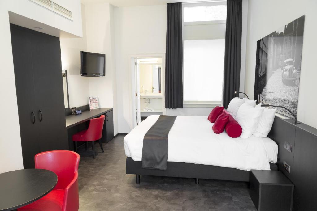 Postel nebo postele na pokoji v ubytování Zimmerhof Hotel
