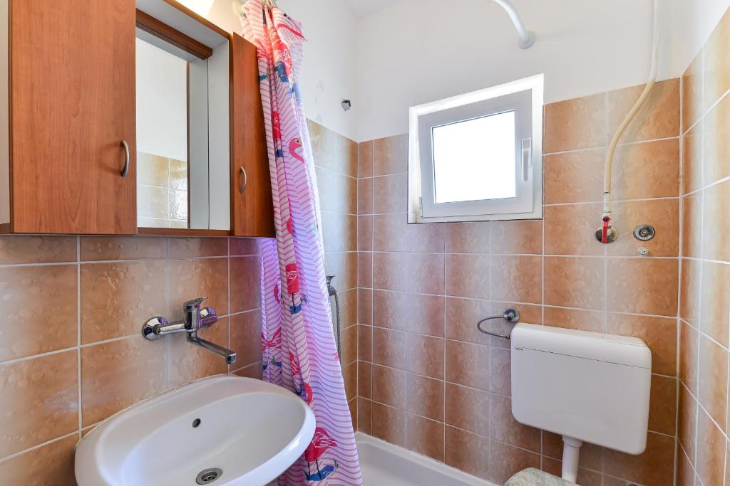Kúpeľňa v ubytovaní Apartments by the sea Bibinje, Zadar - 5786