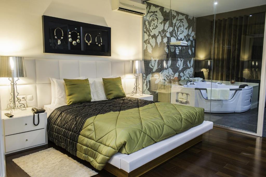 Postel nebo postele na pokoji v ubytování Hotel Vip Praia