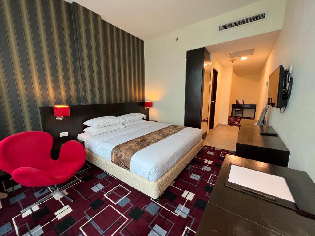 Postel nebo postele na pokoji v ubytování SSL Traders Hotel