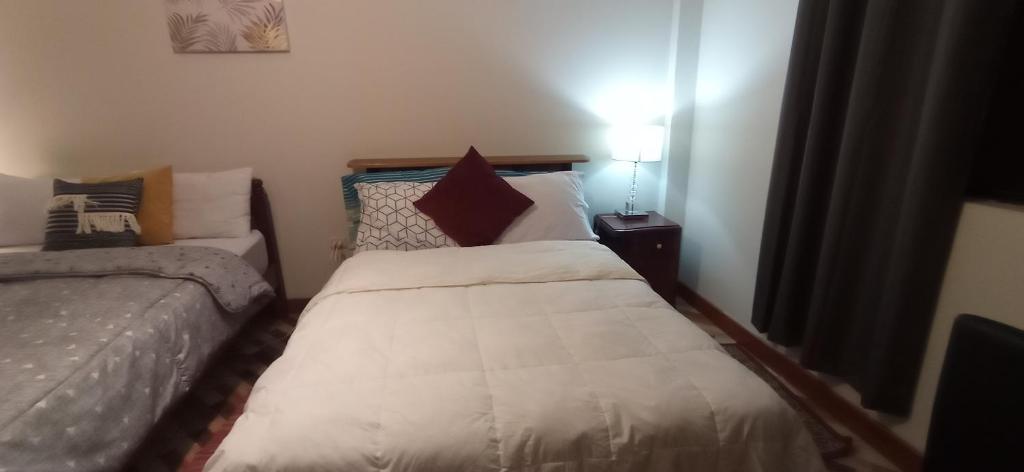 Letto o letti in una camera di jazmines point