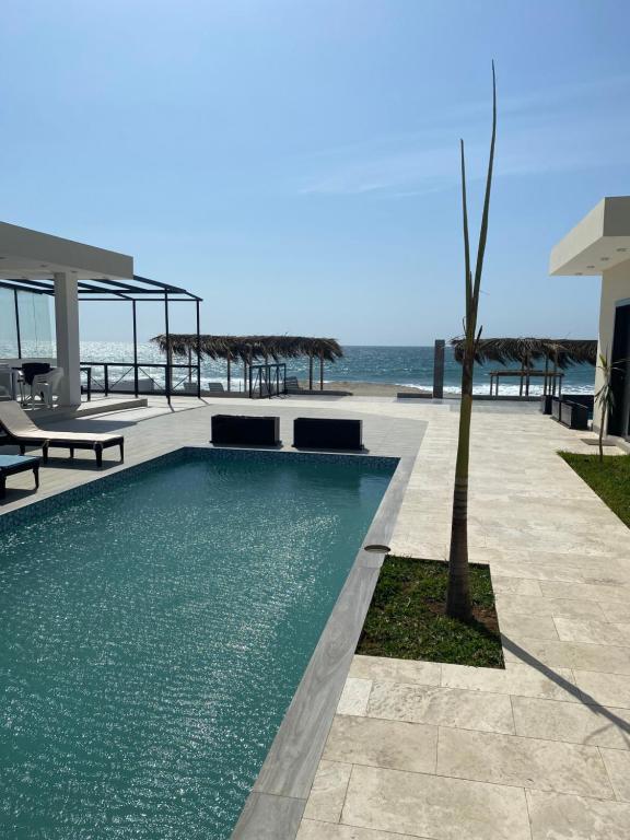 Bazén v ubytování Riviera Vichayito nebo v jeho okolí