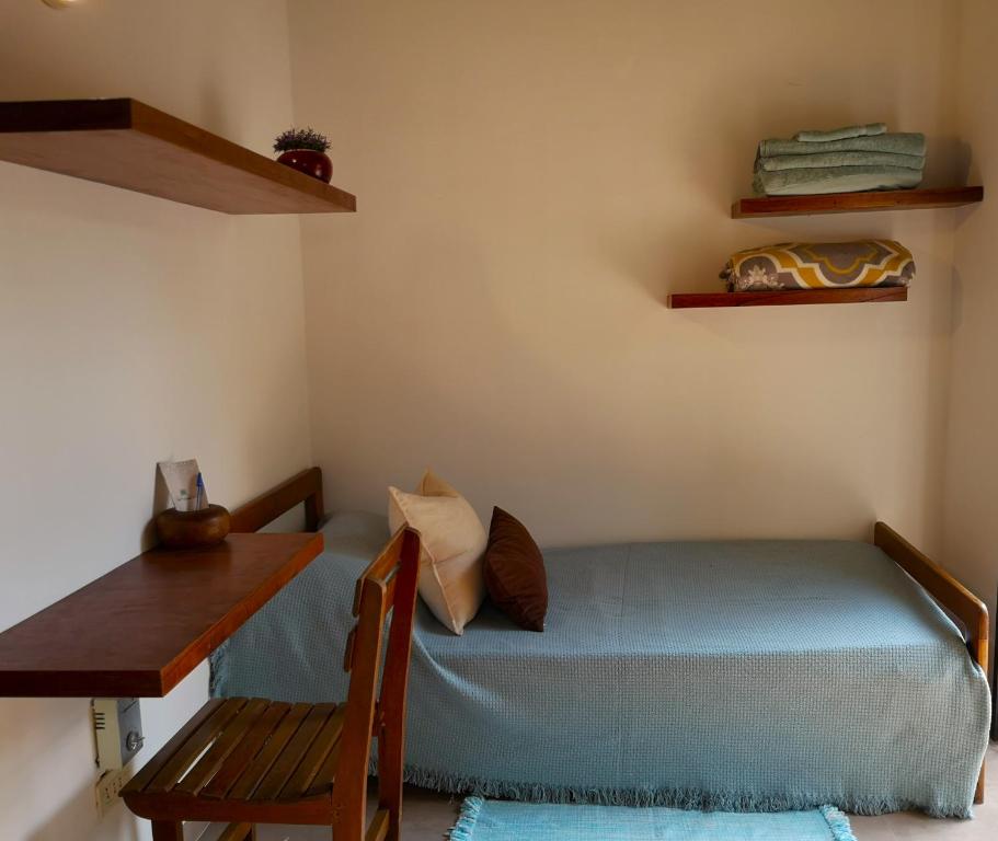 Ένα ή περισσότερα κρεβάτια σε δωμάτιο στο Habitación con baño privado, Violeta Roga