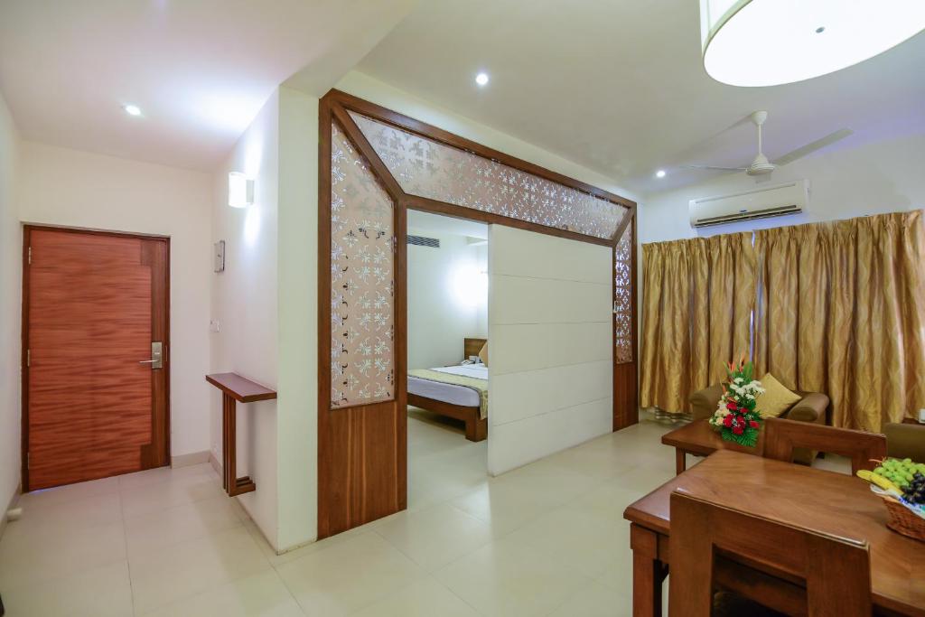 Postel nebo postele na pokoji v ubytování La-Paz Gardens Beacon Hotel - Vasco da Gama Goa