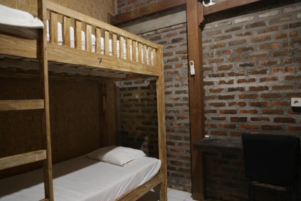 Postel nebo postele na pokoji v ubytování Da Housetel Kuta