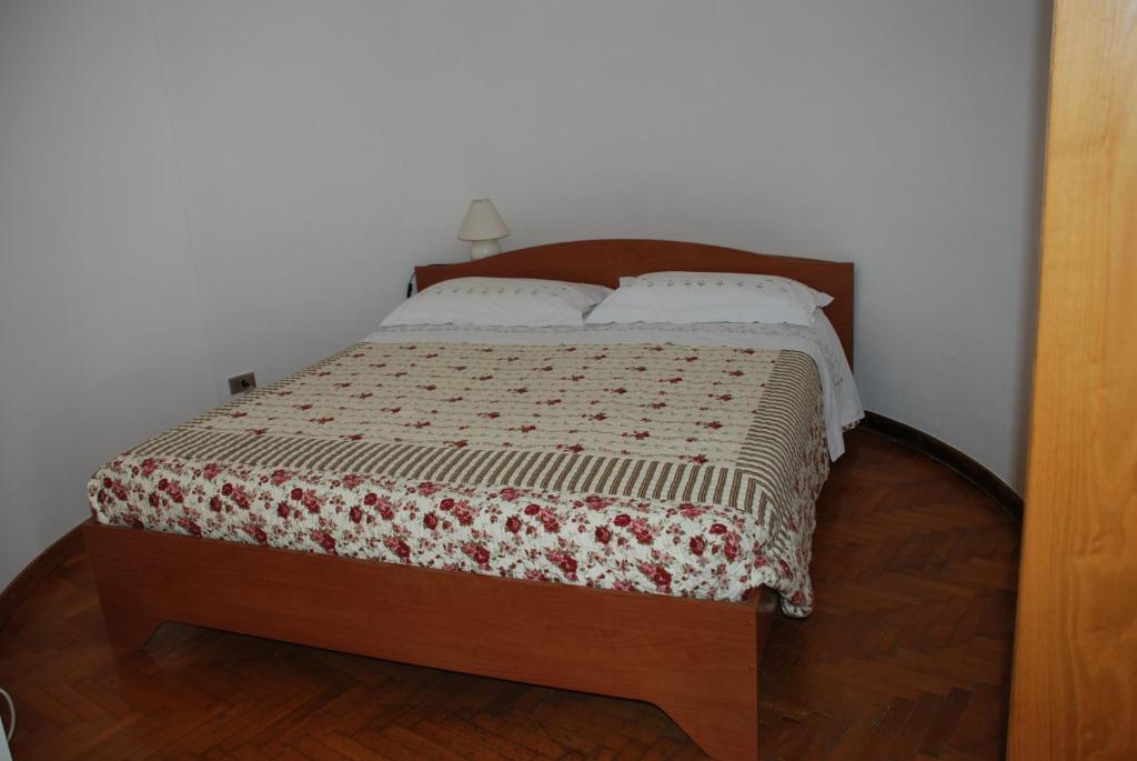 Postel nebo postele na pokoji v ubytování B&B Al Giardino