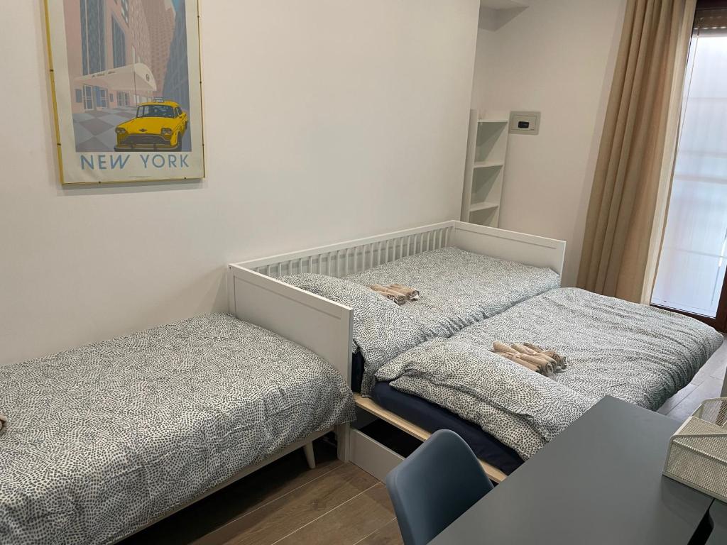 Łóżko lub łóżka w pokoju w obiekcie CRISPI 74.1 - Apartment